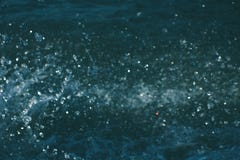 Σταγονίδιο Bokeh από την κίνηση της βάρκας στοκ φωτογραφίες με δικαίωμα ελεύθερης χρήσης Σταγονίδιο Bokeh από την κίνηση της βάρκας στοκ φωτογραφίες με δικαίωμα ελεύθερης χρήσης