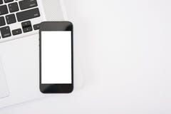 Σύγχρονο γραφείο γραφείων με τον υπολογιστή, το σημειωματάριο και το κινητό τηλέφωνο Στοκ φωτογραφία με δικαίωμα ελεύθερης χρήσης Σύγχρονο γραφείο γραφείων με τον υπολογιστή, το σημειωματάριο και το κινητό τηλέφωνο Στοκ φωτογραφία με δικαίωμα ελεύθερης χρήσης