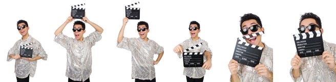 Το άτομο με τον κινηματογράφο clapperboard που απομονώνεται στο λευκό Στοκ φωτογραφία με δικαίωμα ελεύθερης χρήσης Το άτομο με τον κινηματογράφο clapperboard που απομονώνεται στο λευκό Στοκ φωτογραφία με δικαίωμα ελεύθερης χρήσης
