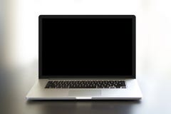 Το απλό MacBook Pro στοκ εικόνα με δικαίωμα ελεύθερης χρήσης Το απλό MacBook Pro στοκ εικόνα με δικαίωμα ελεύθερης χρήσης