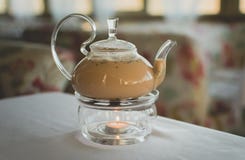 Τσάι Masala διαφανές teapot στοκ εικόνες Τσάι Masala διαφανές teapot στοκ εικόνες