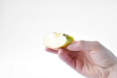 Φέτα της Apple διαθέσιμη στοκ φωτογραφία Φέτα της Apple διαθέσιμη στοκ φωτογραφία