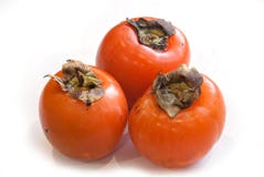 Φρέσκα ώριμα persimmons που απομονώνονται στο άσπρο υπόβαθρο στοκ εικόνες Φρέσκα ώριμα persimmons που απομονώνονται στο άσπρο υπόβαθρο στοκ εικόνες