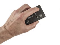 Χέρι που κρατά ένα remotecontrol στοκ φωτογραφία με δικαίωμα ελεύθερης χρήσης Χέρι που κρατά ένα remotecontrol στοκ φωτογραφία με δικαίωμα ελεύθερης χρήσης