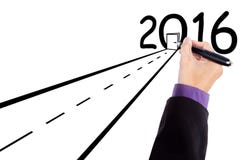 Χέρι που σύρει έναν δρόμο με τους αριθμούς 2016 απεικόνιση αποθεμάτων Χέρι που σύρει έναν δρόμο με τους αριθμούς 2016 απεικόνιση αποθεμάτων