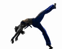 Χορεύοντας σκιαγραφία χορευτών capoeira γυναικών στοκ εικόνες Χορεύοντας σκιαγραφία χορευτών capoeira γυναικών στοκ εικόνες