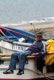 Ψαράς που παίρνει ένα άξιο σπάσιμο στοκ φωτογραφίες Ψαράς που παίρνει ένα άξιο σπάσιμο στοκ φωτογραφίες