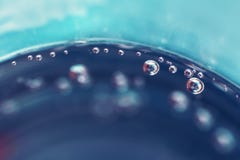 Абстрактная предпосылка воздушных пузырей в стекле с водой Стоковое Фото Абстрактная предпосылка воздушных пузырей в стекле с водой Стоковое Фото