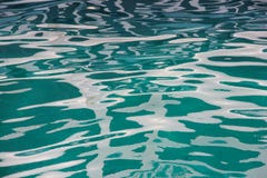 Абстрактная слепимость солнца на морской воде стоковая фотография Абстрактная слепимость солнца на морской воде стоковая фотография