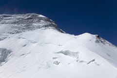 Альпинисты на пике Khan Tengri стоковое фото Альпинисты на пике Khan Tengri стоковое фото