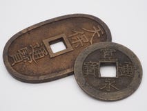 Античные японские монетки стоковая фотография rf Античные японские монетки стоковая фотография rf