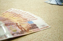 Банкноты 5000 русских рублей предпосылки стоковое изображение rf Банкноты 5000 русских рублей предпосылки стоковое изображение rf