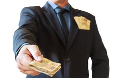 Бизнесмен держа бразильянина денег в его руках и в кармане костюма Белая предпосылка стоковое изображение Бизнесмен держа бразильянина денег в его руках и в кармане костюма Белая предпосылка стоковое изображение