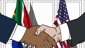 Бизнесмены или политики трясут руки против флагов Южной Африки и США Связанные официальное заседание или сотрудничество бесплатная иллюстрация Бизнесмены или политики трясут руки против флагов Южной Африки и США Связанные официальное заседание или сотрудничество бесплатная иллюстрация