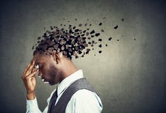 Бортовой профиль частей унылого человека проигрышных головы как символ уменьшенной функции разума стоковое фото Бортовой профиль частей унылого человека проигрышных головы как символ уменьшенной функции разума стоковое фото