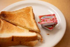 Варенье и тост Smuckers на ресторане стоковые фото Варенье и тост Smuckers на ресторане стоковые фото