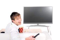 Вахта подростка Tv Стоковые Изображения RF Вахта подростка Tv Стоковые Изображения RF