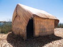 Взгляд Uros плавая камышовые острова, озеро Titicaca, зона Puno, Перу стоковая фотография Взгляд Uros плавая камышовые острова, озеро Titicaca, зона Puno, Перу стоковая фотография