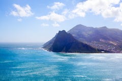 Вода океана бирюзы Seascape, голубое небо, белая панорама облаков, ландшафт Mountain View, перемещение побережья Кейптауна, Южной стоковое фото Вода океана бирюзы Seascape, голубое небо, белая панорама облаков, ландшафт Mountain View, перемещение побережья Кейптауна, Южной стоковое фото