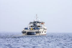 Выйдите от порта Баку в ` Behbudov reshid ` сосуда Каспийского моря, республике Азербайджана, 15-ое марта 2017 стоковые фотографии rf Выйдите от порта Баку в ` Behbudov reshid ` сосуда Каспийского моря, республике Азербайджана, 15-ое марта 2017 стоковые фотографии rf