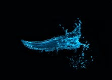 Выплеск воды изолированный на черной предпосылке стоковые фото Выплеск воды изолированный на черной предпосылке стоковые фото