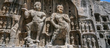 Высекаенный Будда отображает на пещерах Longmen, гротах строба дракона стоковые изображения rf Высекаенный Будда отображает на пещерах Longmen, гротах строба дракона стоковые изображения rf