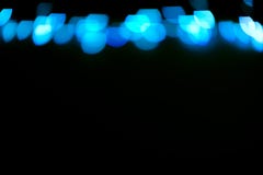 Голубой яркий блеск освещает предпосылку defocused иллюстрация вектора Голубой яркий блеск освещает предпосылку defocused иллюстрация вектора
