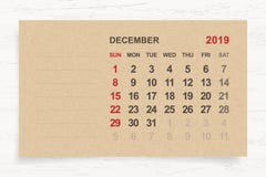 Декабрь 2019 - ежемесячный календарь на предпосылке коричневой бумаги и древесины иллюстрация вектора Декабрь 2019 - ежемесячный календарь на предпосылке коричневой бумаги и древесины иллюстрация вектора