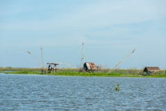 Деревня рыболова в Таиланде с несколькими удя инструментов вызвала стоковое фото Деревня рыболова в Таиланде с несколькими удя инструментов вызвала стоковое фото