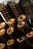 Десерт Caneles французский традиционный от Бордо стоковые изображения Десерт Caneles французский традиционный от Бордо стоковые изображения