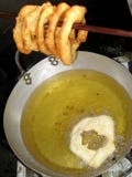 Десерт блюда Перу: Buñuelos с медом ` chancaca ` традиционным Сфотографированный в Arequipa, Перу стоковая фотография Десерт блюда Перу: Buñuelos с медом ` chancaca ` традиционным Сфотографированный в Arequipa, Перу стоковая фотография