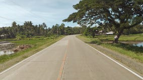 Дорога деревни Движение на мотоцилк philippines Остров Bohol Управлять вперед сток-видео Дорога деревни Движение на мотоцилк philippines Остров Bohol Управлять вперед сток-видео