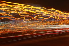 желтый цвет померанцового красного цвета светов moving стоковая фотография rf желтый цвет померанцового красного цвета светов moving стоковая фотография rf