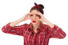 Женщина peeking смотреть через пальцы как бинокли стоковая фотография Женщина peeking смотреть через пальцы как бинокли стоковая фотография