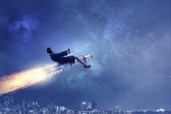 Женщина на ракете космоса стоковая фотография Женщина на ракете космоса стоковая фотография