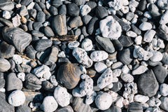 Закройте вверх округленных камней пляжа и камней камешка стоковая фотография Закройте вверх округленных камней пляжа и камней камешка стоковая фотография