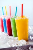 Замороженная слякоть Granitas плодоовощ в пластичных чашках Стоковая Фотография RF Замороженная слякоть Granitas плодоовощ в пластичных чашках Стоковая Фотография RF