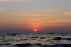 Заход солнца океана в облачном небе Аравийское море, Goa, Индия стоковые фото Заход солнца океана в облачном небе Аравийское море, Goa, Индия стоковые фото