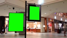 Зеленая афиша для вашего объявления внутри торгового центра центра Coquitlam Зеленая афиша для вашего объявления внутри торгового центра центра Coquitlam