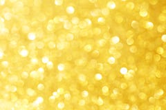 Золотые яркие блески искры с влиянием bokeh и selectieve фокус Праздничная предпосылка с яркими светами золота, пузырь шампанског стоковые фотографии rf Золотые яркие блески искры с влиянием bokeh и selectieve фокус Праздничная предпосылка с яркими светами золота, пузырь шампанског стоковые фотографии rf