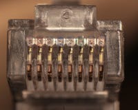 Кабель ethernet поднимает домкратом в стиле marco стоковые изображения Кабель ethernet поднимает домкратом в стиле marco стоковые изображения