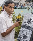 Картина художника на улице в Каракасе Венесуэле, портрете стоковая фотография rf Картина художника на улице в Каракасе Венесуэле, портрете стоковая фотография rf