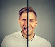 Концепция биполярного расстройства Молодой человек с двойным выражением стороны стоковые фотографии rf Концепция биполярного расстройства Молодой человек с двойным выражением стороны стоковые фотографии rf
