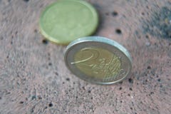 Концепция дела, макрос 2 монетки евро и 50 центов стоковые изображения Концепция дела, макрос 2 монетки евро и 50 центов стоковые изображения