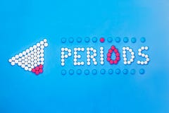 Концепция периодов женщины Периоды надписи сделанные таблеток боли на голубой предпосылке стоковые изображения rf Концепция периодов женщины Периоды надписи сделанные таблеток боли на голубой предпосылке стоковые изображения rf