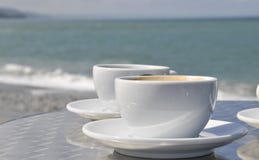 кофейные чашки пляжа Стоковые Фото кофейные чашки пляжа Стоковые Фото