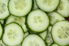 Куски огурца как предпосылка Зеленые свежие огурцы как предпосылка Текстура картины огурца Vegetable фото еды Стоковые Фотографии RF Куски огурца как предпосылка Зеленые свежие огурцы как предпосылка Текстура картины огурца Vegetable фото еды Стоковые Фотографии RF