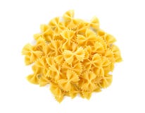 Куча макаронных изделий Farfalle (бабочек) на белой предпосылке Стоковая Фотография Куча макаронных изделий Farfalle (бабочек) на белой предпосылке Стоковая Фотография