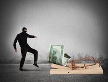 Ловушка денег похитителя стоковое изображение Ловушка денег похитителя стоковое изображение
