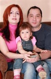 мать отца дочи сидя вахта tv Стоковая Фотография мать отца дочи сидя вахта tv Стоковая Фотография